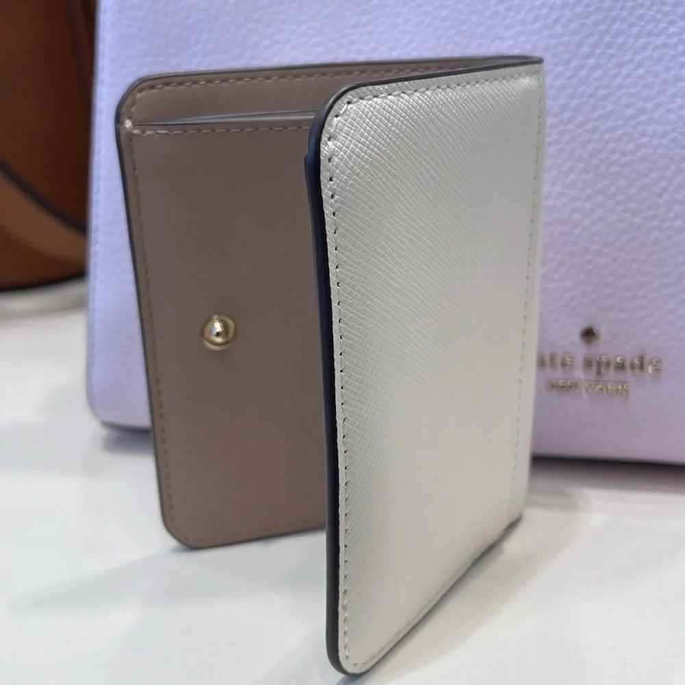 Kate Spade Madison Small Bifold Wallet
Meringue 
NWT - Picture 4 of 16